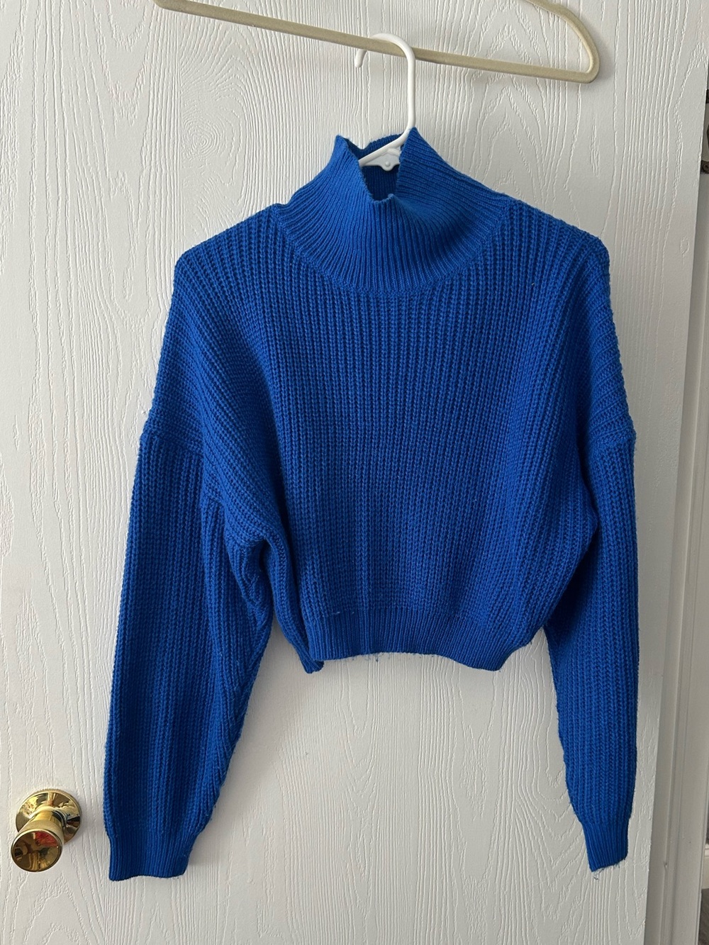 Vestique crop sweater